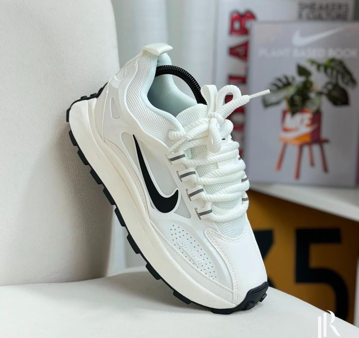 NIKE BAILLELY